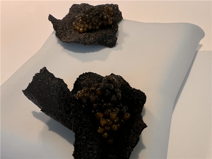 squid ink cracker with caviar